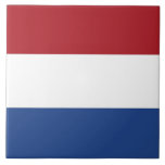 Netherlands Flag Tile<br><div class="desc">Add a touch of Dutch elegance to your home decor with our exclusive tile featuring the flag of the Netherlands! Crafted with meticulous attention to detail, this tile is more than just a decorative piece; it’s a celebration of Dutch heritage and cultural pride. The stunning design prominently displays the iconic...</div>