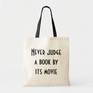 Never judge a book tote bag