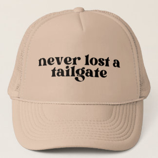 Never lost a tailgate trucker hat, football  trucker hat