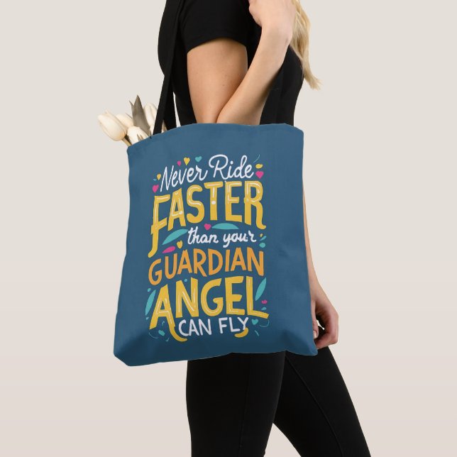 Never ride faster than your guardian angel can fly tote bag (Close Up)