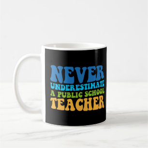 Never Underestimate A Public School Teacher Coffee Mug