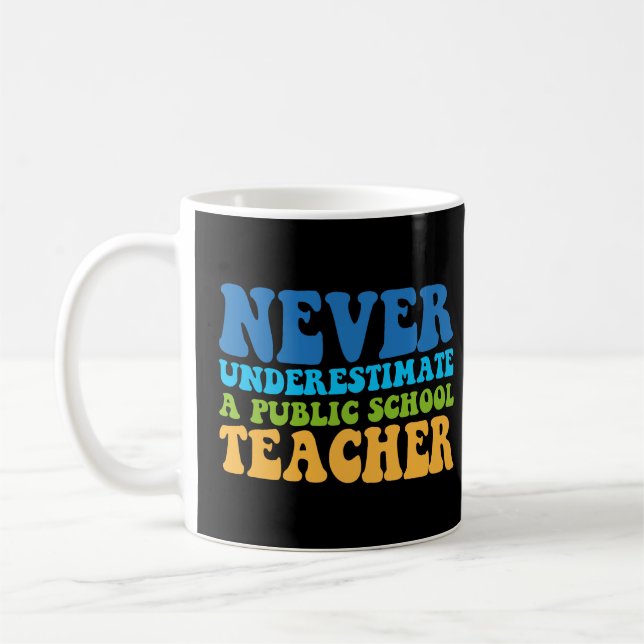 Never Underestimate A Public School Teacher Coffee Mug (Left)