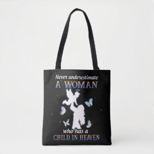 Never underestimate a woman who has a child in hea tote bag