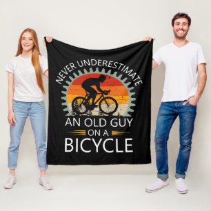 Never Underestimate An Old Guy On A Bicycle Fleece Blanket