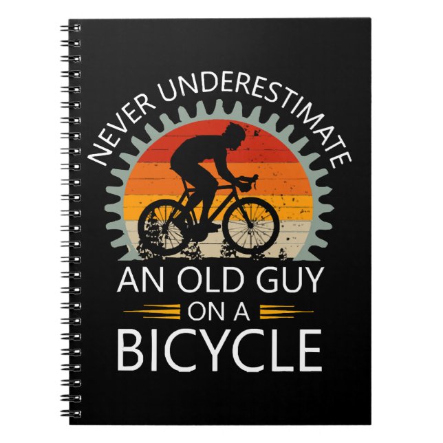  Never Underestimate An Old Guy On A Bicycle Notebook (Front)
