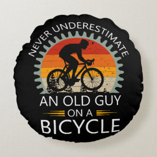 Never Underestimate An Old Guy On A Bicycle Round Cushion