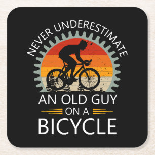Never Underestimate An Old Guy On A Bicycle Square Paper Coaster