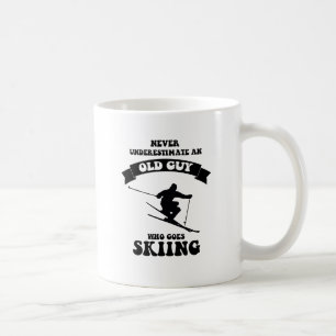Never underestimate an old guy who goes skiing coffee mug