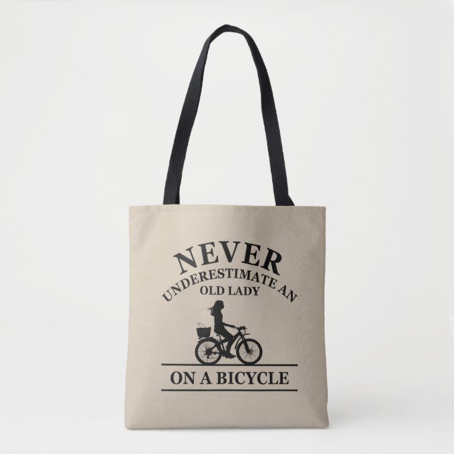 Never underestimate an old lady on a bicycle  tote bag (Front)