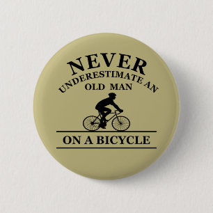 never underestimate an old man on a bicycle 6 cm round badge