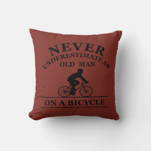 never underestimate an old man on a bicycle cushion