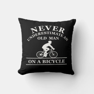 never underestimate an old man on a bicycle cushion