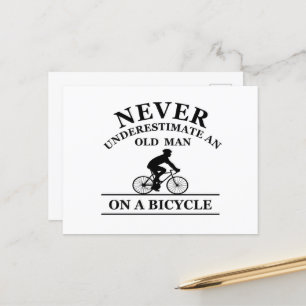 never underestimate an old man on a bicycle holiday postcard