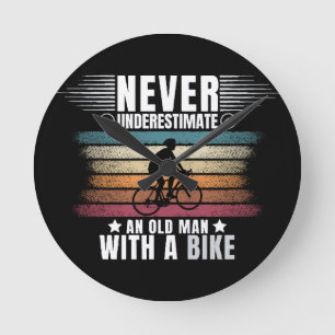 Never Underestimate An Old Man On A Bike Round Clock