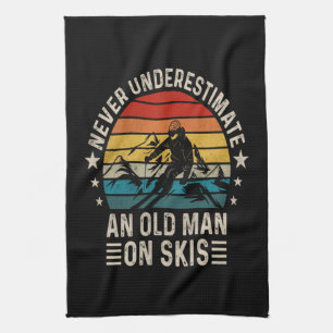 Never Underestimate An Old Man On Skis Retro Tea Towel