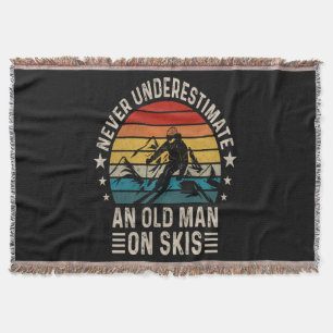 Never Underestimate An Old Man On Skis Retro Throw Blanket