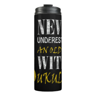 Never underestimate an old man with a ukuleleThis  Thermal Tumbler