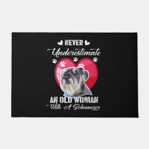 Never Underestimate an old woman with a schnauzer Doormat