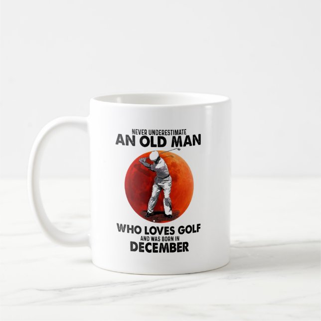 Never Underestimate Old December Man Loves Golf Coffee Mug (Left)