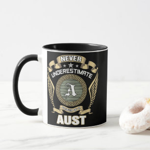 NEVER_UNDERESTIMATE_POWER_OF_A_AUST MUG