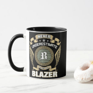 NEVER_UNDERESTIMATE_POWER_OF_A_BLAZER MUG