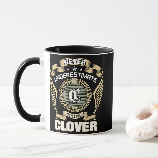 NEVER_UNDERESTIMATE_POWER_OF_A_CLOVER MUG (With Donut)
