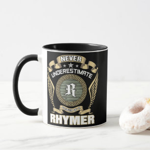 NEVER_UNDERESTIMATE_POWER_OF_A_RHYMER MUG