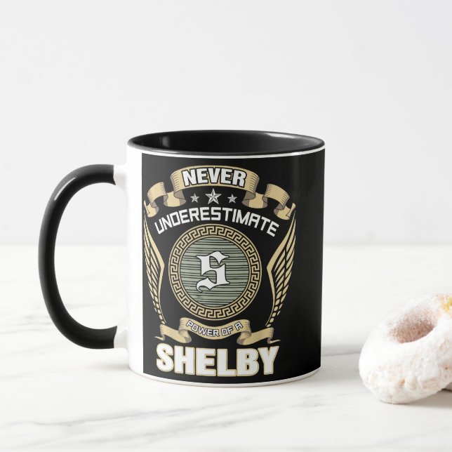 NEVER_UNDERESTIMATE_POWER_OF_A_SHELBY MUG (With Donut)