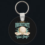 Never Underestimate The Old Guy Golfing Golf Funny Key Ring<br><div class="desc">Never Underestimate The Old Guy Golfing Golf Funny</div>