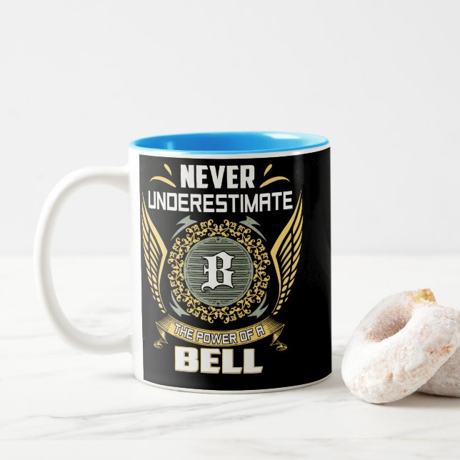 Never Underestimate The Power Of A Bell Two-Tone Coffee Mug (With Donut)