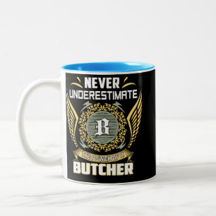 Never Underestimate The Power Of A Butcher Two-Tone Coffee Mug