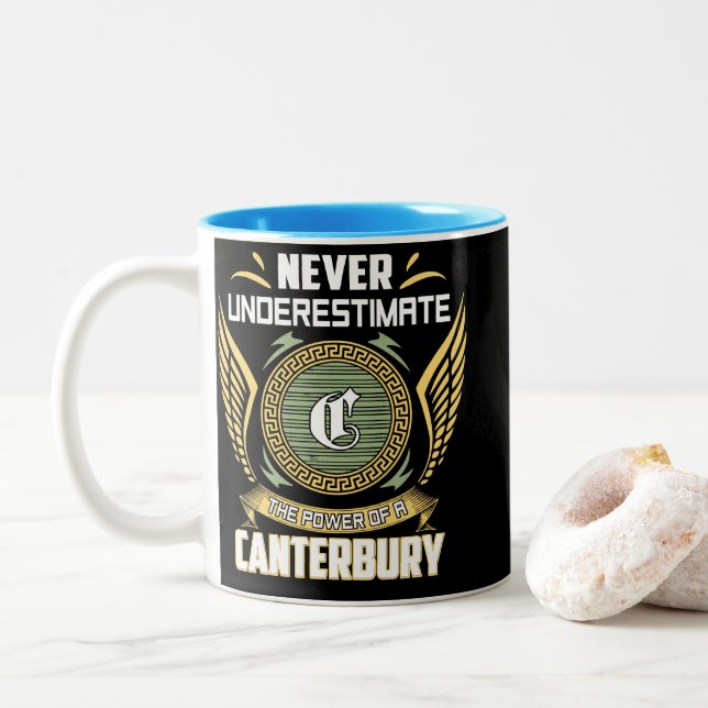 Never Underestimate The Power Of A Canterbury Two-Tone Coffee Mug (With Donut)
