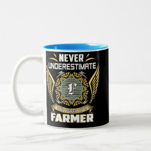 Never Underestimate The Power Of A Farmer Two-Tone Coffee Mug
