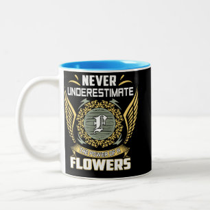Never Underestimate The Power Of A Flowers Two-Tone Coffee Mug