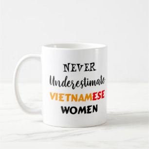 never underestimate vietnamese women coffee mug