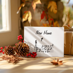 New home, song bird carrying key of new home      save the date