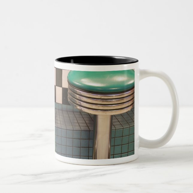 New Mexico, Albuquerque. The 66 Diner along Two-Tone Coffee Mug (Right)