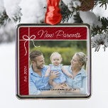 New Parents Family First Christmas Photo Metal Ornament<br><div class="desc">Celebrate your first year as parents with a heartfelt keepsake ornament! Personalise this charming Christmas tree decoration with a treasured photo of your new family, along with your baby's name and birth date. It's a beautiful way to capture this special milestone and create lasting memories for years to come. Perfect...</div>