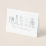 New York City Hanukkah NYC Jewish Holiday Chanukah Foil Card<br><div class="desc">Card features an original illustration of a row of classic New York City landmarks, "dressed up" for the Hanukkah holiday, printed in a pretty foil finish. Great for anyone who lives in or loves NYC. "New York Hanukkah" design is also available on lots of other cards and products from RebeccaHeartsNY....</div>