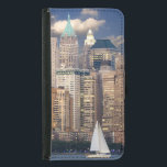 New York City Skyline Samsung Galaxy S5 Wallet Case<br><div class="desc">Fabulous photo of the New York city skyline in the evening. The image has a sail boat on the waterfront in the foreground and the background is populated with the many interesting bright and shiny skyscrapers and buildings, The photo was taken at dusk when the evening sky has a twilight...</div>