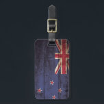 New Zealand Flag on Old Wood Grain Luggage Tag<br><div class="desc">New Zealand Flag on Old Wood Grain Feel free to modify the design according to your own preferences. You may change the design location, orientation, background colours and size. Also, you may add your own text, or slogan set its font, location and size, all in order to create the ultimate...</div>