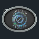 NEW ZEALAND KORU PAUA BELT BUCKLE<br><div class="desc">Classic New Zealand koru and map in the vibrant colors of the Paua shell.</div>