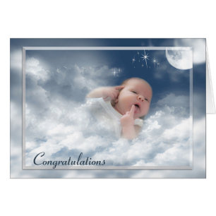 Newborn Baby in Cloud Blanket