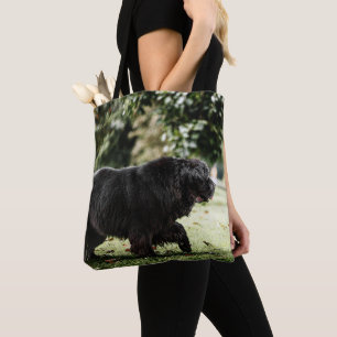 newfoundland black in motion tote bag
