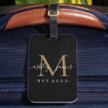 Newlywed Mr Mrs Monogram Names Year Gold Black Luggage Tag<br><div class="desc">Chic, modern and simple monogrammed luggage tag with the text Mr and Mrs in white elegant handwritten script calligraphy on a black background with your monogram in gold. Simply add your married name, year established and monogram in stylish typography. Perfect luxury gift for the newlywed couple's wedding guests. Exclusively designed...</div>