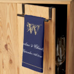 Newlywed Or Wedding Gift Elegant Monogram Navy Tea Towel<br><div class="desc">Newlywed Or Wedding Gift Elegant Monogrammed Initial Personalised Bride And Groom Names Navy Blue, Gold And White Kitchen Towel. Perfect wedding gift for newlyweds, a cherished reminder of their special day, or a gift for your own home. Click personalise this template to customise it with the names, monogram initial, and...</div>