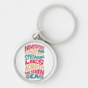 Newspapers radios and Tv´s spreading lies across t Key Ring