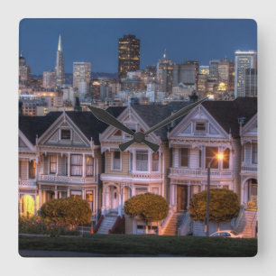 Night view of 'painted ladies' houses square wall clock