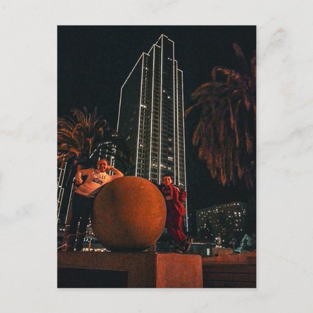 Nighttime City Skyscraper with Orange Sphere  Postcard (Front)