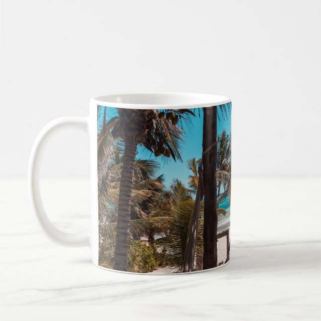 Nipa hut under coconut palm trees coffee mug (Left)